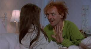 Fred gets his head stuck in the fridge and in his attempt. Drop Dead Fred 1991