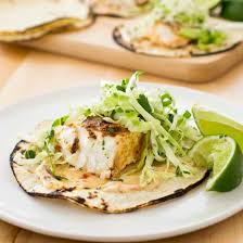Fill the tacos with the cabbage, fish, salsa, chilli soured cream and avocado and tuck in. Slow Cooker California Style Fish Tacos America S Test Kitchen