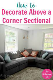 How To Decorate Above A Corner Sectional Sofa 3 Simple Pretty Ideas Corner Sectional Sofa Couch Decor Corner Sectional