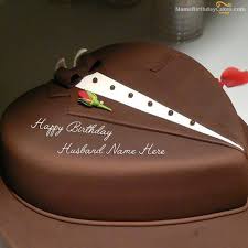 There are many ways you can celebrate his birthday. Write Name On Chocolate Heart Cake For Husband Happy Birthday Wishes