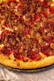 Spread sauce over dough round, leaving a 1cm border. Meat Lovers Pizza Recipe Queenslee Appetit