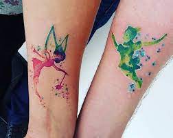 Tinker bell (also nicknamed tink or miss bell) is the tritagonist of disney's 1953 animated feature film, peter pan. 25 Cute Disney Tattoos That Are Beyond Perfect Stayglam Cute Disney Tattoos Disney Couple Tattoos Disney Tattoos