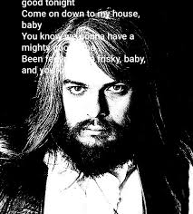 Who are the people in the photo with Leon Russell?