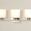 Vanity light fixture with outlet receptacle. 1