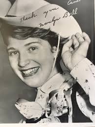 Sept. 9, 1954 my dad, Ted Dinsmore, took this picture of Marilyn Bell  touching the breakwater in Toronto as she finished her crossing of Lake  Ontario. He won a National Newspaper Award