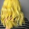 Keep one ponytail little higher than other. 3