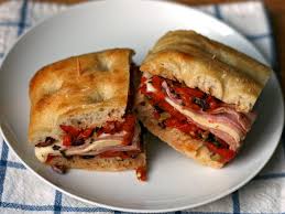 After about 20 minutes add remaining water, salt and as much of the remaining flour as needed and mix on medium speed to create a ball of dough that is just slightly tacky and winds around the. Muffaletta Sandwich Tastings Gourmet Market