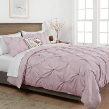 The matching pillow shams feature the same reversible design. Mauve Bedding Target
