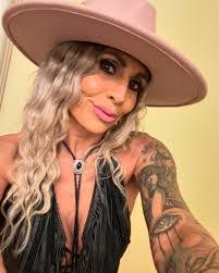 Kelly Vela's Instagram, Twitter & Facebook