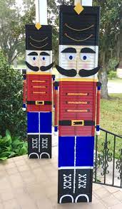 Diy Christmas Nutcrackers Painted From Old Bi Fold Louver Doors Nutcracker Christmas Decorations Nutcracker Christmas Christmas Props