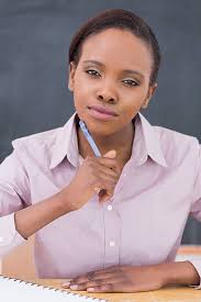 Black Teacher Looking At Camera While Thinking Attentively Studying School  Photo Background And Picture For Free Download