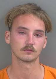 22-year-old MICHAEL DOCK from NAPLES was booked