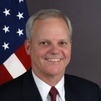 Col. Andrew P. Keane, 108th Wing Commander, left, passes