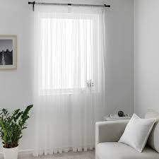 Curtains with a sheer fabric provide privacy, while letting daylight through, helping you feel connected with the world outside the window. Hildrun Sheer Curtains 1 Pair White Dotted 145x300 Cm Ikea