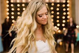 This curly wedding updo will show off your gorgeous wedding eye makeup. 24 Wedding Worthy Hairstyles For Curly Hair