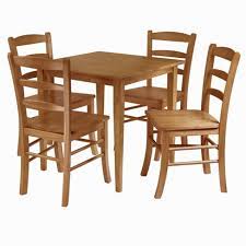 Pack up your kitchen table: 5pc Groveland Extendable Dining Table Set With Ladder Back Chairs Wood Light Oak Winsome Target