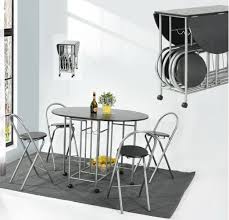 The table and chairs of the darcia are constructed of sturdy metal with a matte black finish. Eggree Foldable Dining Table And 4 Chairs Set 5pcs Butterfly Kitchen Folding Dining Table And Chairs With Movable Casters Black Buy Online In Oman At Oman Desertcart Com Productid 47896685