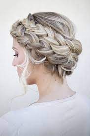 Double Wrap Around Durch Braids The Effortlessly Messy Look Is Chic And Slightly Bohemian Unique Braids Braided Hairstyles Hair Styles