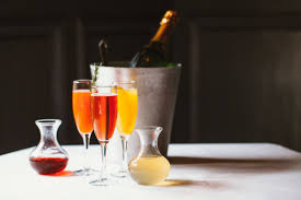 In a champagne flute, add the cranberry juice and a squeeze of lime. 20 Best Champagne Cocktails Easy Champagne Drink Recipes We Love