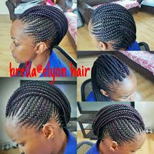 Braided mohawk with curly weave for black hair. Cornrow Mohawk With A Hint Of Purple Beautiful African Hair African Hairstyles African Braids Hairstyles