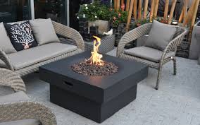 Combining a fire pit with a coffee or dining table marries the best of both worlds into a focal piece that invites friends and family to relax and settle in for a night of great food and conversation. Modeno Branford Fire Pit Table Ofg141lp Gardenlines