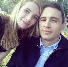 James Franco and Emma Roberts embrace