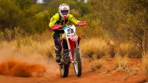 It involves competitors in both car and bike categories. Finke Desert Race 2019 Mark Grove Penrite Honda 450cc Motorbike Chasing Overall Victory Herald Sun