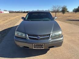 Image result for Yellow 2004 Impala