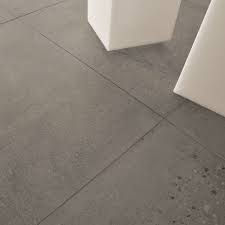 Guide to using floor leveling compounds for setting tile. Concrete Tiles Ciot