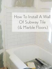 It Wouldn T Be A Bathroom Project Without Some Major Tiling To Do Here S A Recap Of How We Installed Subway Shower Tile Subway Tile Showers Marble Tile Floor