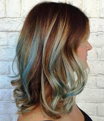 Add a few silver blonde streaks throughout your hair to really give it the boom it needs. Gimme The Blues Bold Blue Highlight Hairstyles