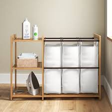 A hamper with wheels from neatfreak is perfect for the job. 3 Bag Laundry Sorter Wayfair