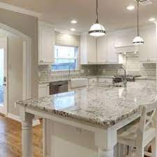 5 Shocking Reasons Why You Should Use Granite For Your Kitchen Countertop White Granite Kitchen Kitchen Remodel Countertops White Granite Countertops