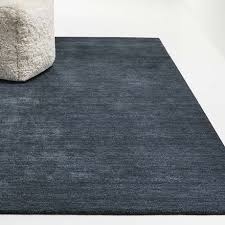 Featuring a striking palette of rich indigo and navy, this area rug can't help but turn heads. Baxter Navy Blue Wool Rug Crate And Barrel