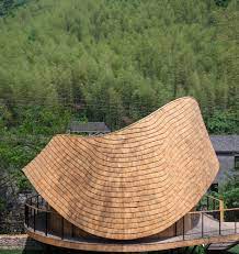 Cruck frames use largely curved timbers to support the roof directly down to the foot roof pitch: Gallery Of Treewow O A Tree House Of Curved Round Roof Monoarchi 3