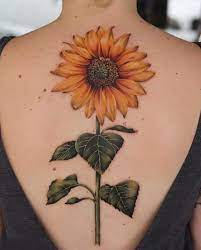 This floral tattoo is more about the statement than. Sunflower Tattoos Meanings Tattoo Styles Ideas