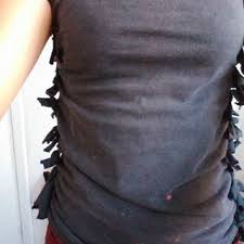 Simplest way (for women) is to just take a safety pin, pull the sides back tightly, and use the pin to secure the extra parts at the back. How To Resize An Oversized T Shirt Without Sewing 4 Steps With Pictures Instructables