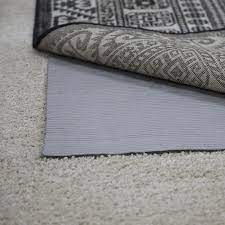 Rebond, memory foam, and rubber. Karastan Studio Reversible Pet Proof Rug Pad