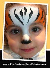 1 2 Face Painting Tiger Perfect For A Fast Design With The Full Amount Of Fun Professionalfacepainter Face Painting Easy Lion Face Paint Tiger Face Paints