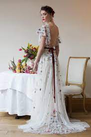 This Gorgeous Bridal Gown Inspired By Modern Folklore Is Crafted From Tillie Chantilly Embroidered Wedding Dress Wedding Dresses Unique Colored Wedding Dresses