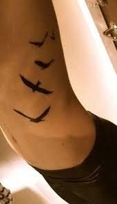 Flying Bird Tattoo On Ribs Flying Birds Tattoo Ideas Bird Tattoo Ribs Cute Tattoos Fly Away Tattoo