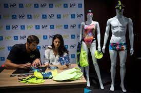 Today, competitive swimwear is a major business for companies like speedo, arena and tyr and its development involves such institutions as nasa and australian institute of sport. Phelps Headed To Tokyo 2020 As Swimwear Salesman News People 794525