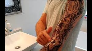 Religious sleeve tattoos are the primary means of showing personal beliefs. My Experience With A Full Sheet Temporary Arm Tattoo For Men Youtube