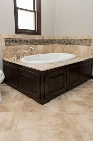 The set includes four spacious shelves for optimum storage and is designed to be installed direct to the. Beige Tile Tub Surround With Brown And Green Tile Accent Wall Tile Tub Surround Tub Surround Bathroom Wall Tile