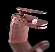 gold finish waterfall bathroom sink