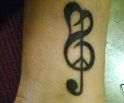 If you like the look of a guitar then this might be the tattoo you are looking for. 27 Amazing Peace Tattoo Ideas With Meanings Body Art Guru