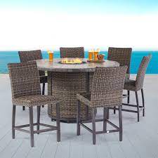 Cushions are made with sunbrella® fabric that is resistant to stains, mildew, chlorine and fading Springdale 7 Piece High Dining Set With Firetable Patio Dining Set Patio Furniture Sets Outdoor Dining Table