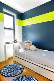 See more ideas about kids bedroom, boys bedrooms, boy room. With Crisp White Walls And Warm Wood Floors This Manhattan Home Becomes The Perfect Backdrop For D Boys Room Wall Color Kids Bedroom Wall Color Boy Room Paint