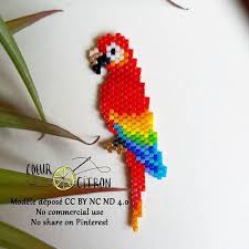 Cheri J Ai Retreci Le Perroquet Mais Je N Ai Pas Eu Le Temps De Le Tisser Pour Maitresse Du Coup Je Lui Ai Off Artisanat A Perlesperles Art Perle Perles Diy