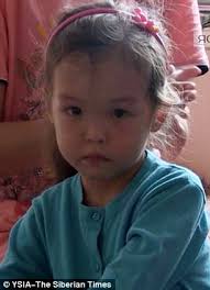 Russian 'Mowgli girl' is discharged from hospital: Toddler, three, who  survived 12 days and nights in remote forest with only dog for company gets  clean bill of health